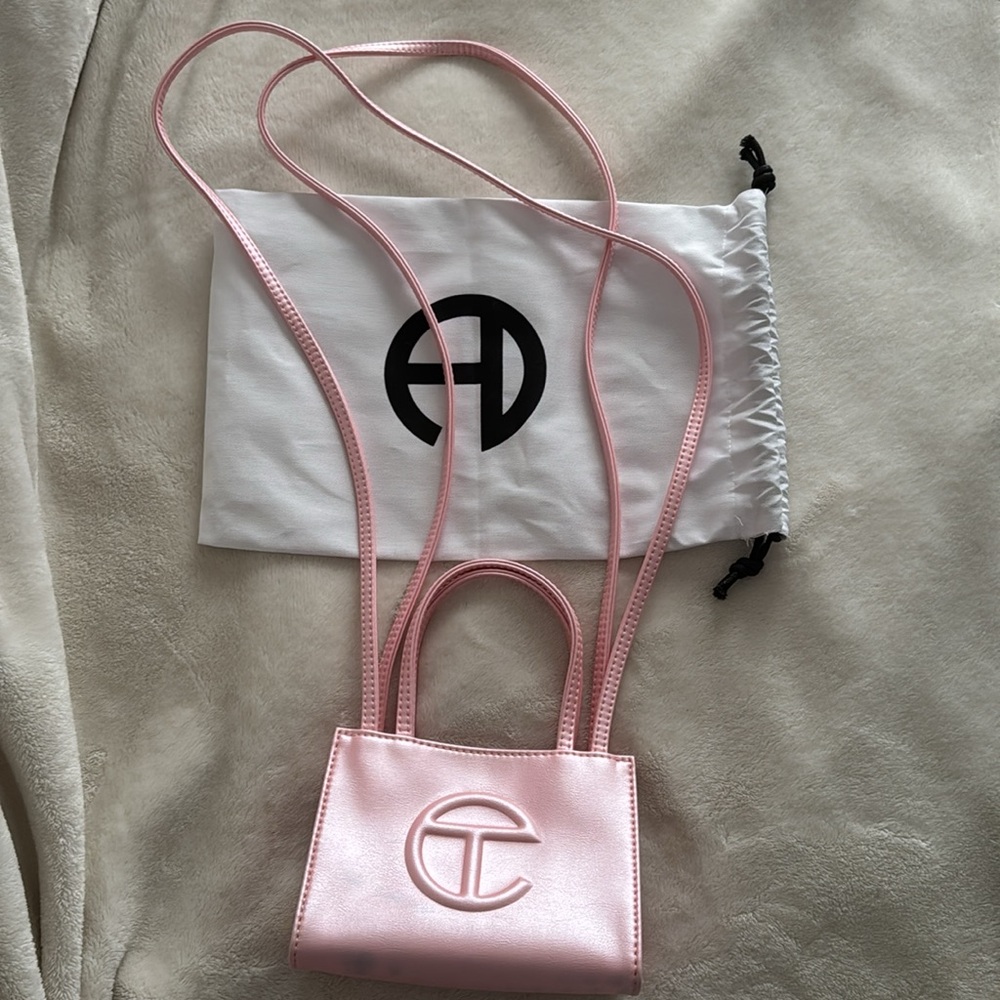 Small ballerina pink double strap small bag. Has marks on it
